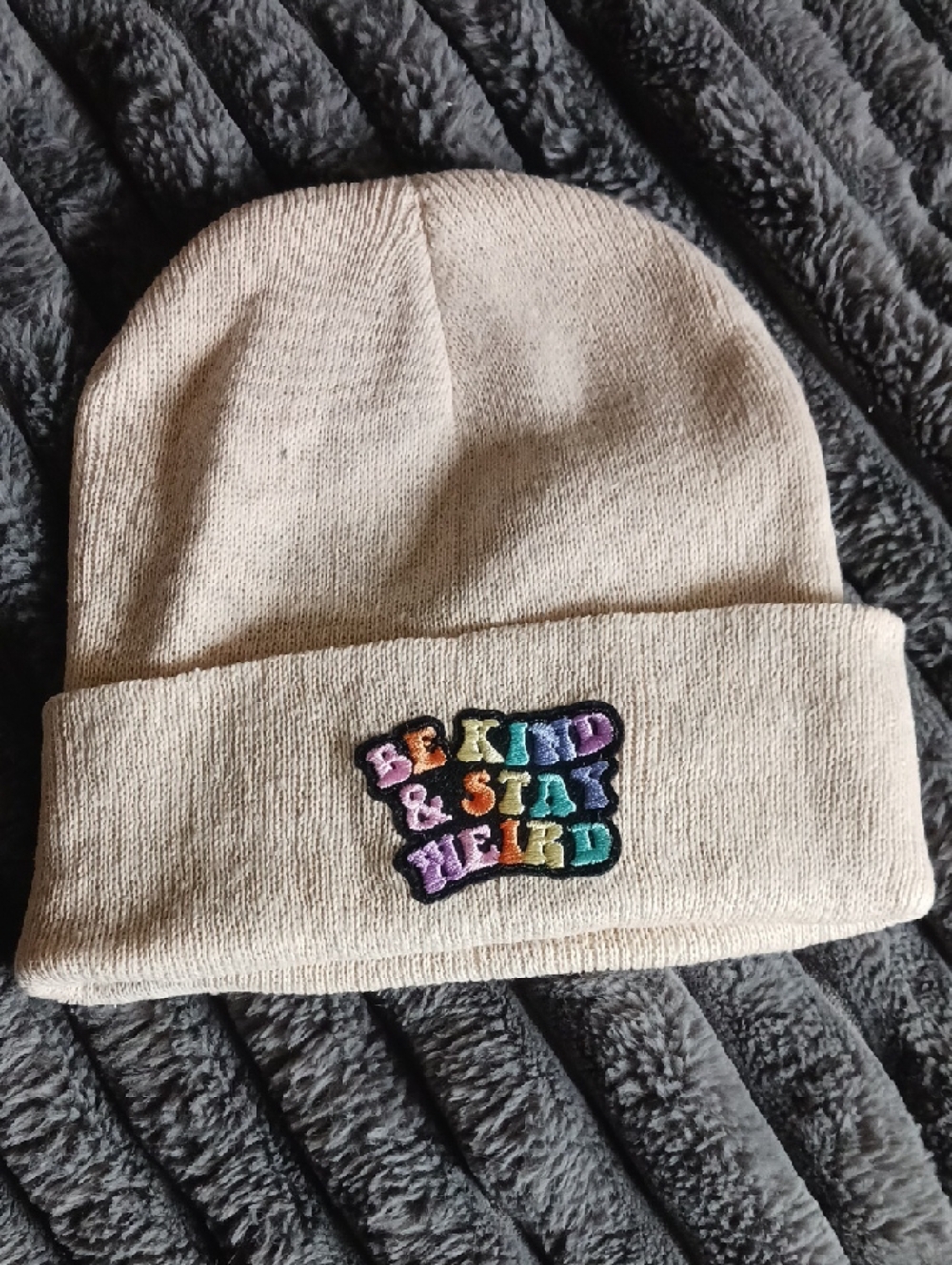 Kids Beanie Hat with Rainbow 'Be Kind & Stay Weird' Patch - Cream